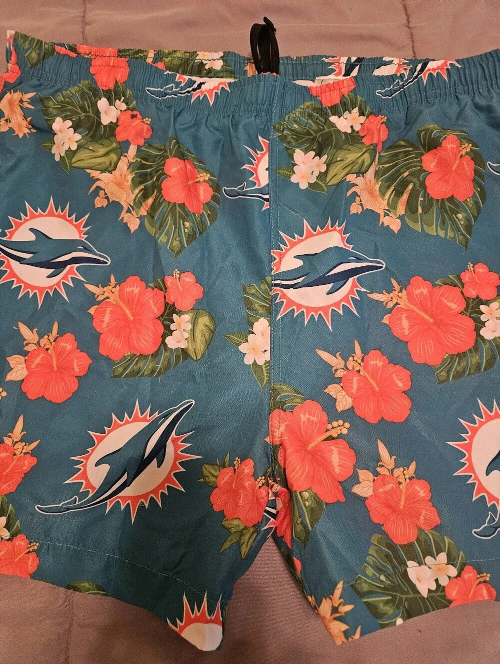 NFL Men’s Dolphins Teal Swim Trunks with Coral Floral Print